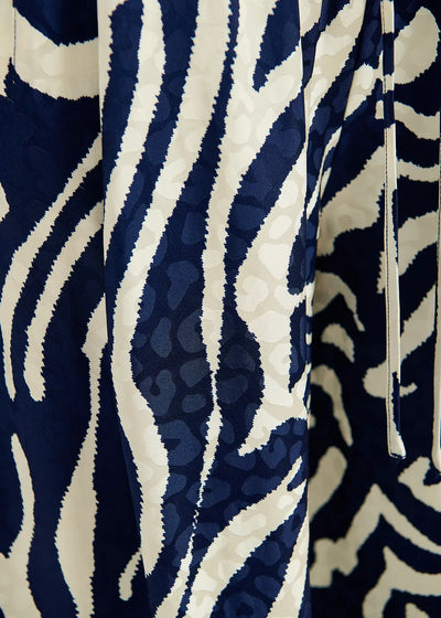 Essentiel Antwerp FIBONACCI Navy blue and off-white zebra-print wide-leg pants