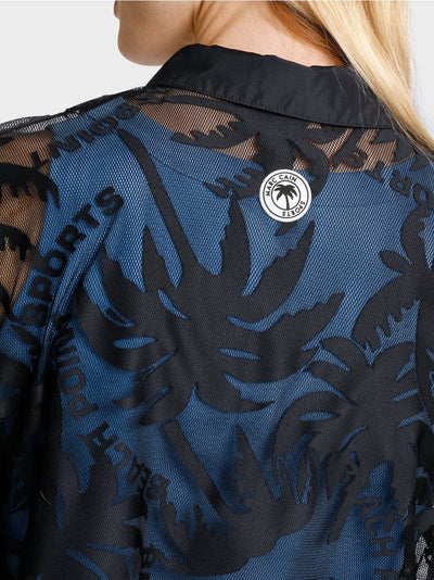Marc Cain Midnight Blue Mesh polo shirt with palm tree design
